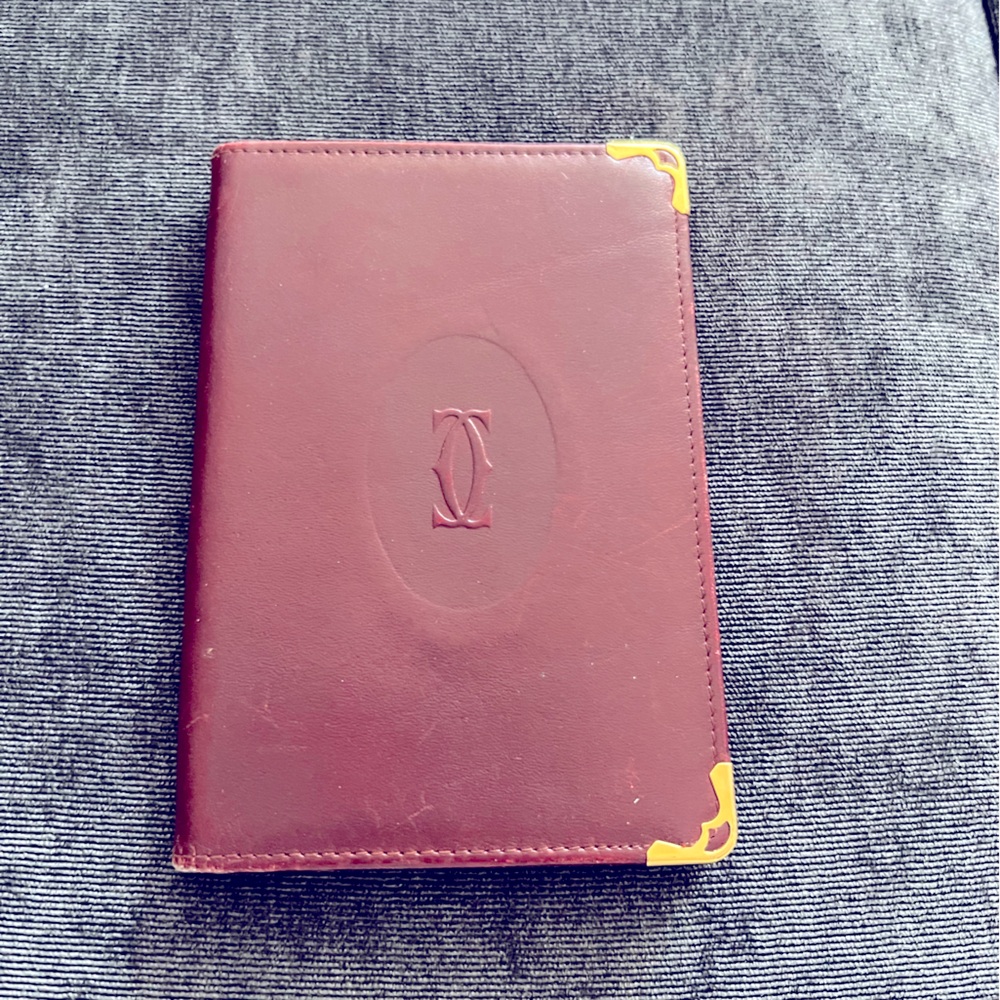 Cartier vintage burgundy leather address book.